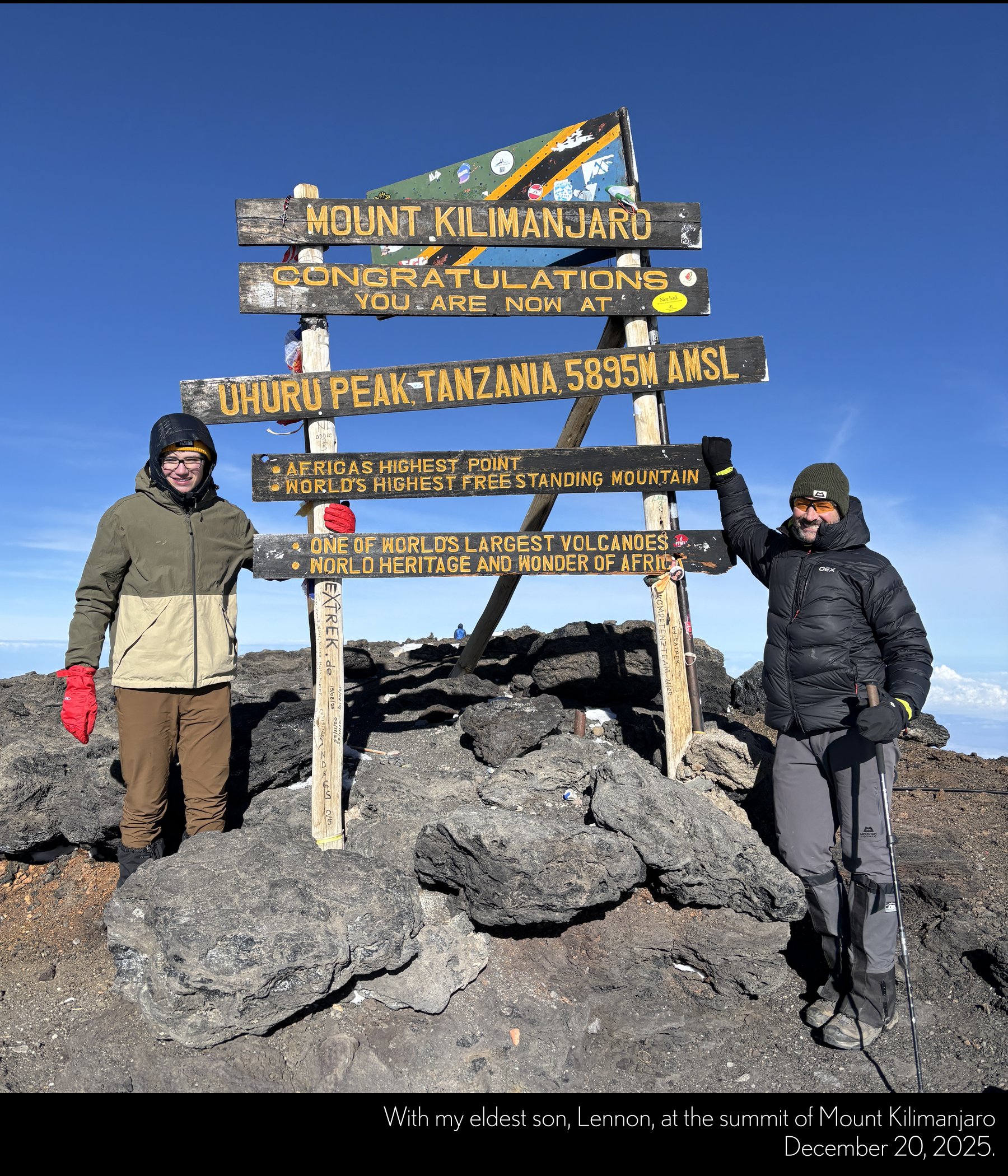 Pablo with Lennon at the summit of Mount Kilimanjaro